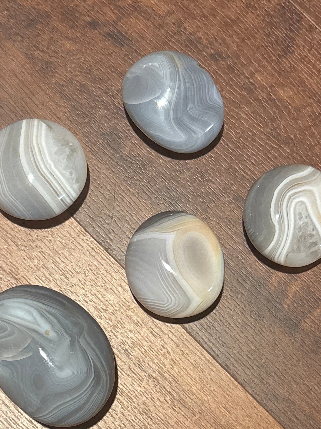 Banded agate palm stones
